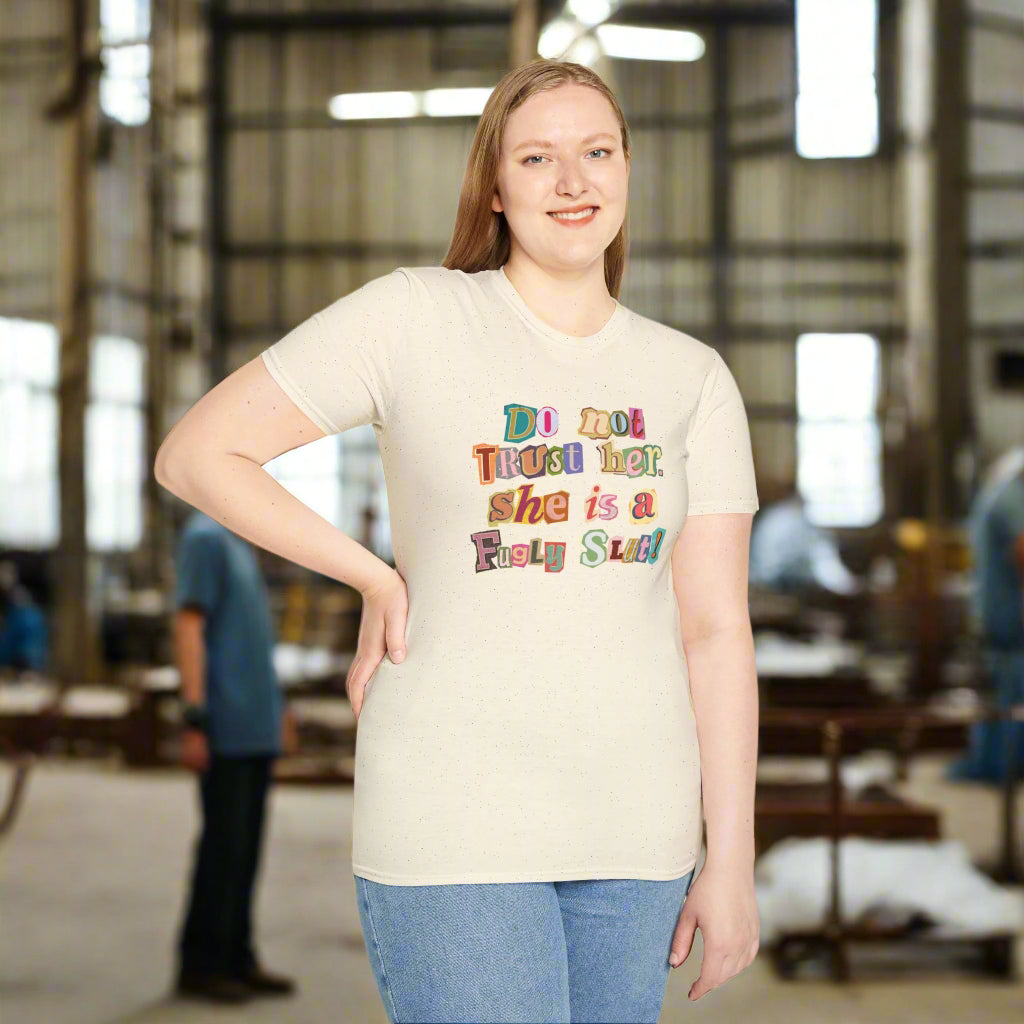Woman wearing a cream t-shirt with colorful text design on a white background