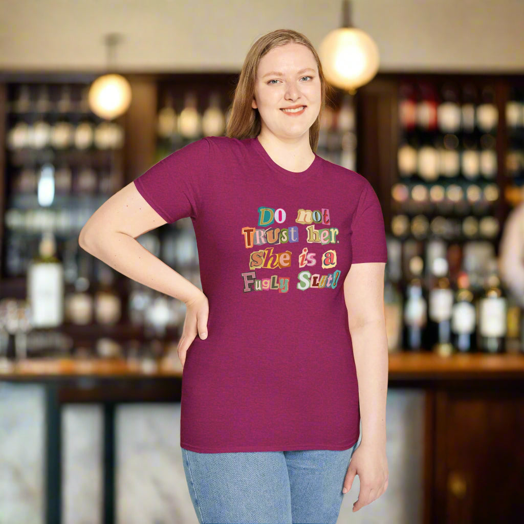 Woman wearing a purple t-shirt with colorful text on a white background