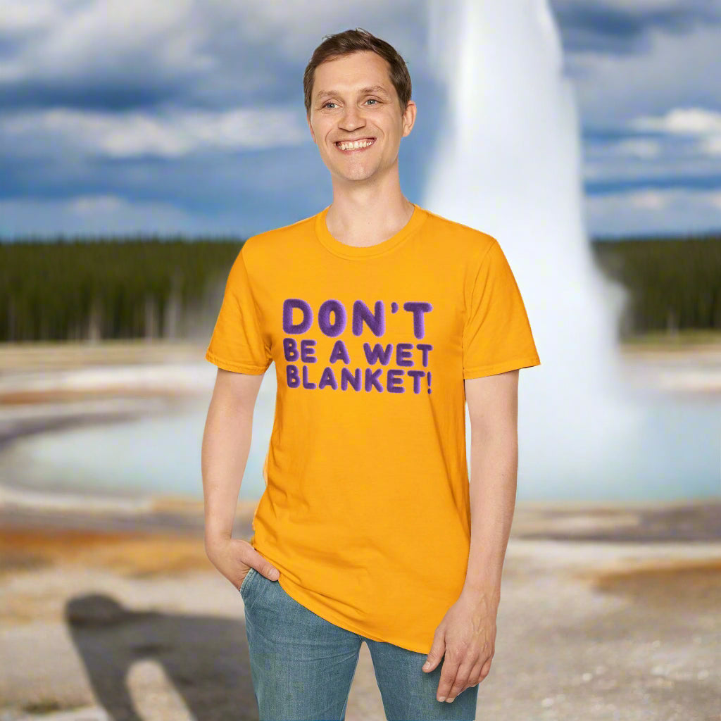 Person wearing a yellow t-shirt with text on a white background
