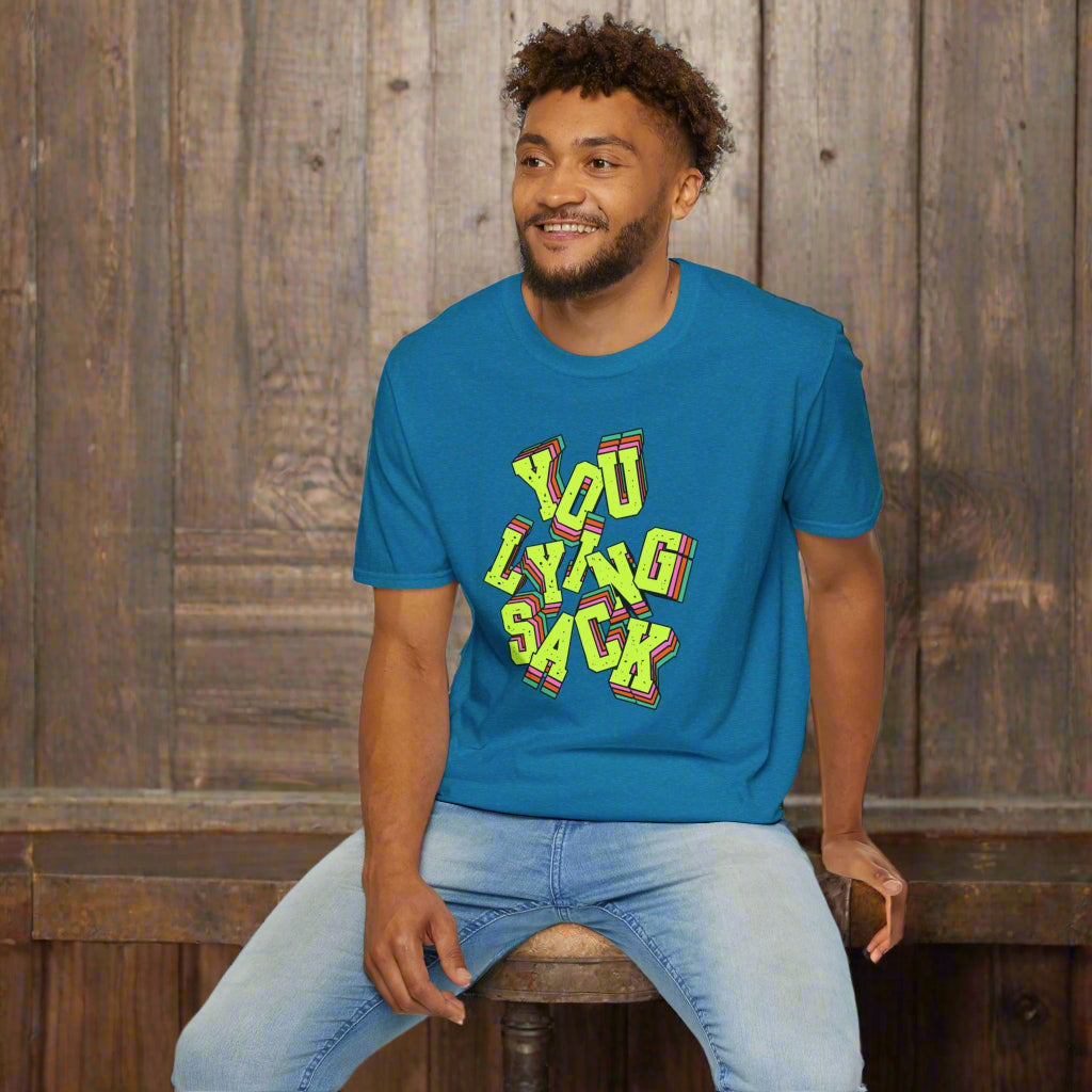 Man wearing a blue t-shirt with colorful text design on a white background