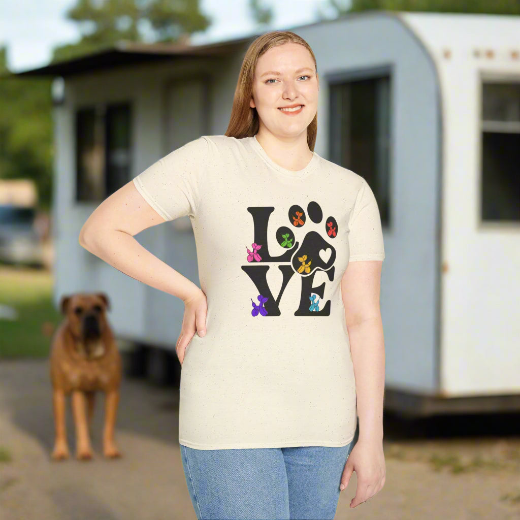 Person wearing a cream t-shirt with a colorful 'LOVE' graphic design on a white background