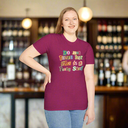 Woman wearing a purple t-shirt with colorful text on a white background