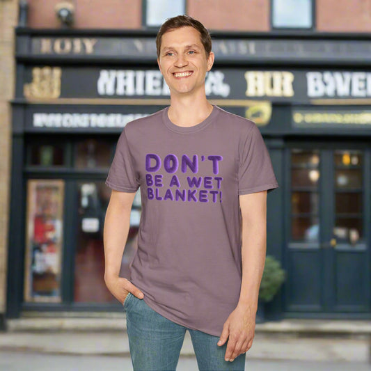 Person wearing a purple t-shirt with text on a white background
