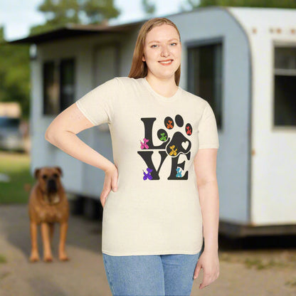 Person wearing a cream t-shirt with a colorful 'LOVE' graphic design on a white background
